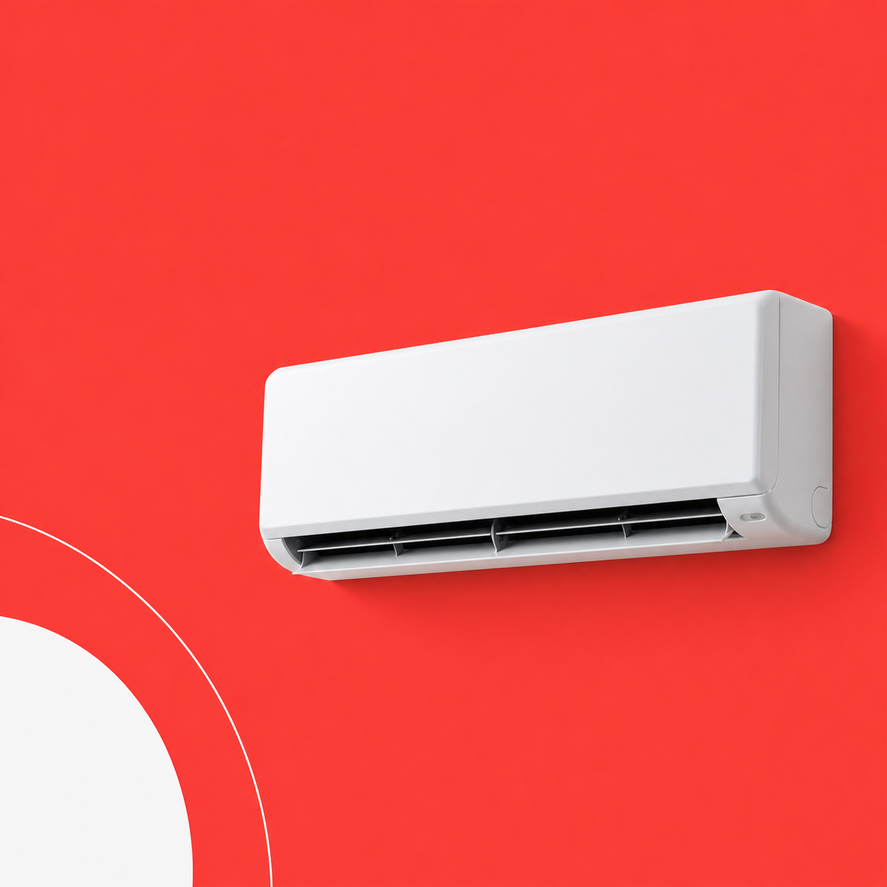 White split air conditioner on a red studio background.