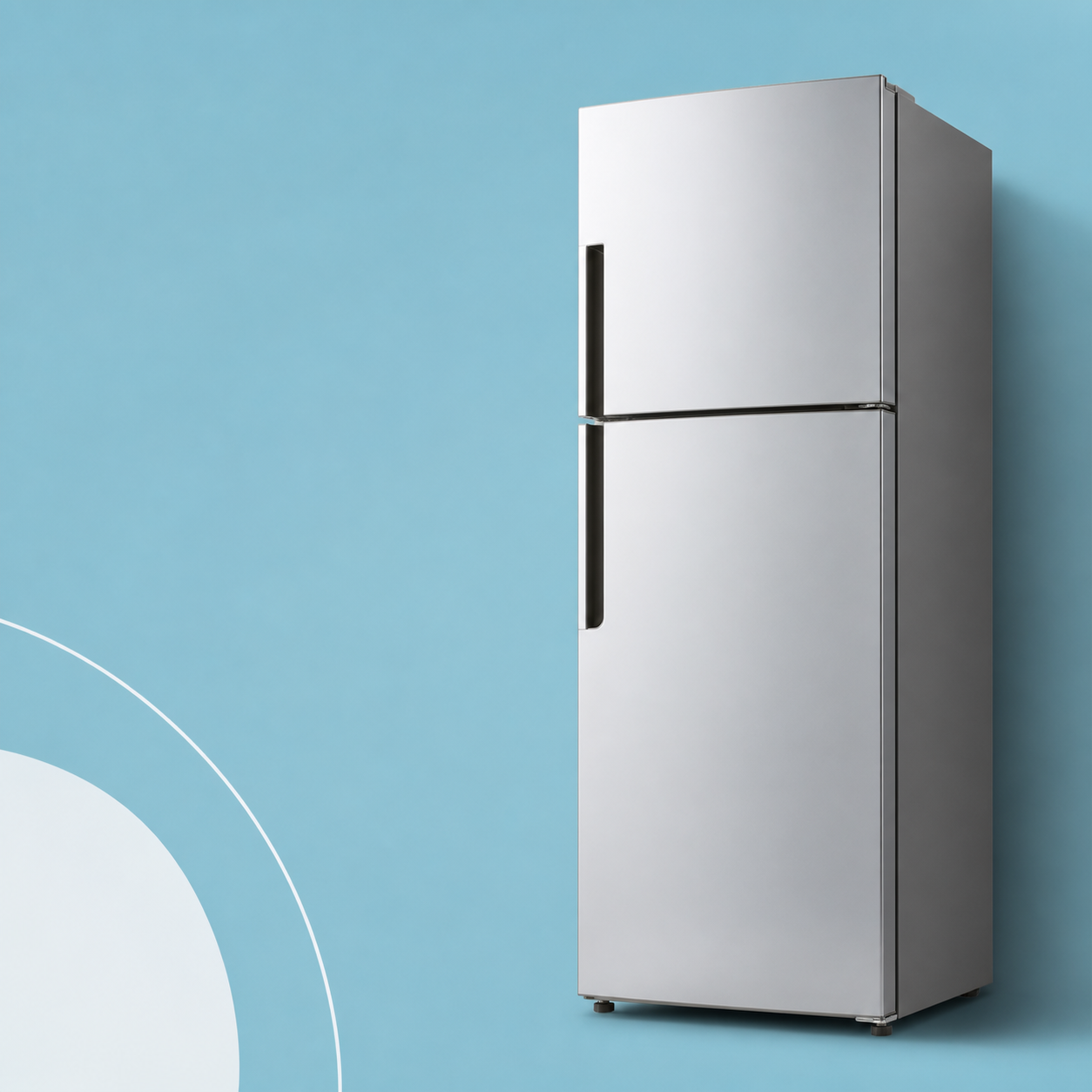 Silver refrigerator on a blue studio background.